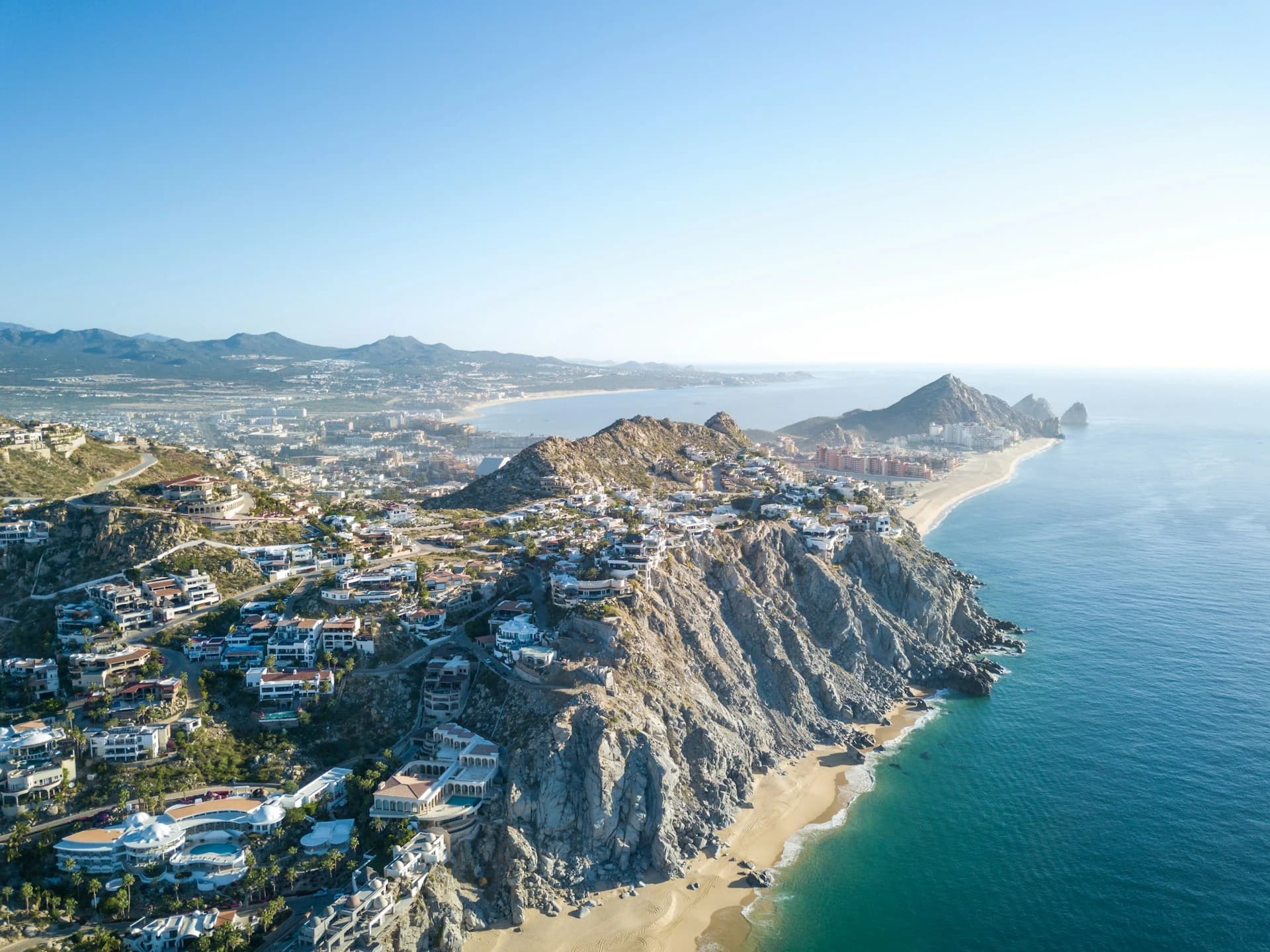 Sunny March day at Land's End in Cabo San Lucas with a tour boat near El Arco