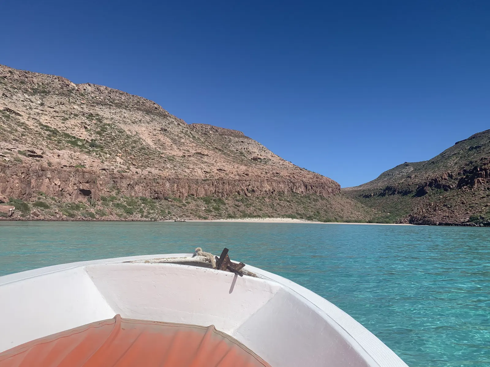 Tour boat cruising around Isla Espiritu Santo in the Sea of Cortez, La Paz, Mexico