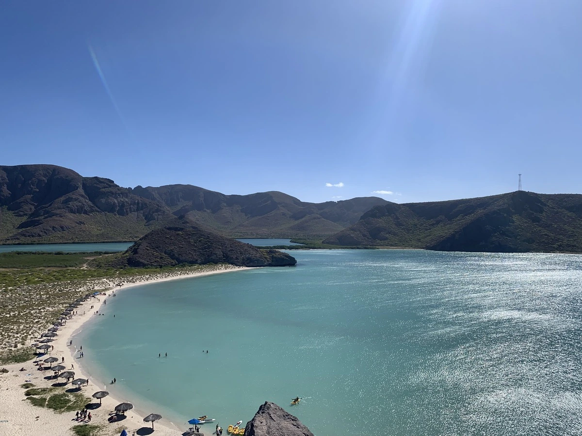 Playa Balandra bay at high tide with turquoise water and Mushroom Rock, La Paz, Mexico