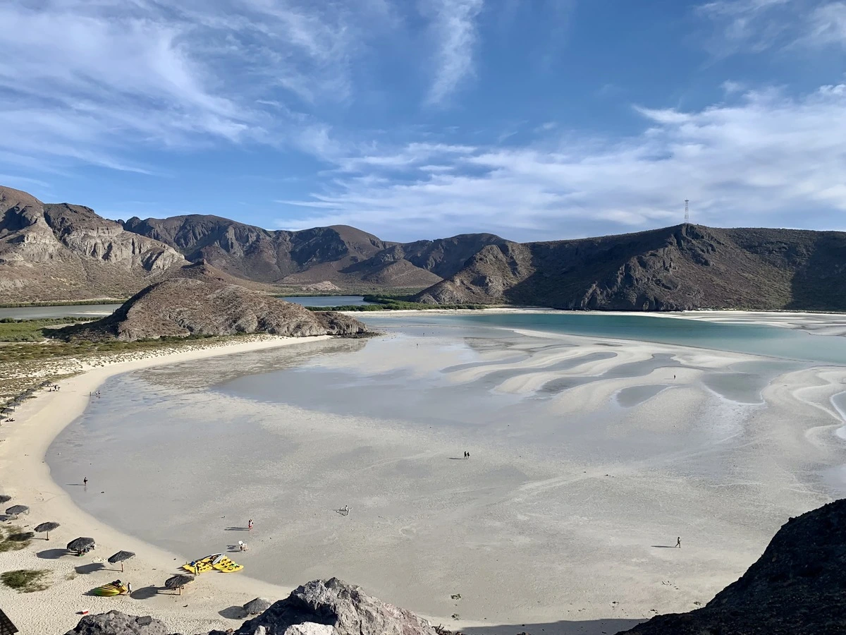 Playa Balandra bay at low tide with shallow sandflats exposed, La Paz, Mexico